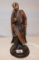 RESIN ORIENTAL MAN HOLDING A BOWL & ROPE MEASURES 10.5
