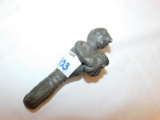 HAND HELD CARVED CEREMONIAL PIECE WITH URN IN HANDS 5.5