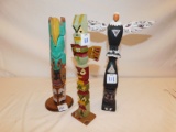 3 CARVED WOODEN TOTEM POLES, 1 EAGLE WITH SPREAD WINGS, 1 FACE TOTEM OTTAWA