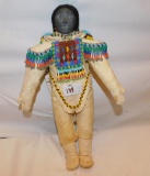 ESKIMO DOLL, BY R. SINNISIAK, MADE BY A CANADIAN ESKIMO WITH ORIGINAL TAG,