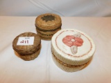 3 SMALL BASKETS, 1 WHITE BASKET MADE OF STRAW HAS A FLORAL DESIGN 3 1/2