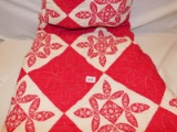 HAND MADE QUILT RED & WHITE IN COLOR, MEASURES APPROXIMATELY  74