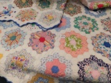 QUILT HAND MADE BLUE SCALLOPED EDGE, WHITE BACKGROUND, MULTI COLORED HEXAGO