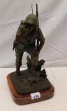 BRONZE MARINE GI JOE CA 01' CARVED IN THE BACK, WOODEN BASE WITH BUILT IN L
