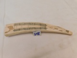 CARVED BONE WITH SEAL HEAD AND FISH ETCHED INTO IT, MADE INTO CRIBBAGE GAME