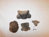 4 CLAY HEADS, ONE IS CHIPPED ON LEFT SIDE AS SHOWN, MEASURE FROM 3.5