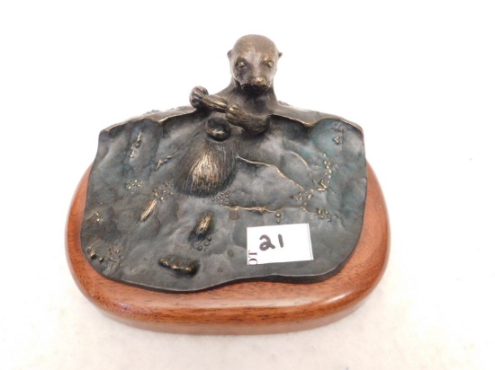 BRONZE SEA OTTER BY WAH CHANG, SIGNED.  MEASURES 3 1/4"