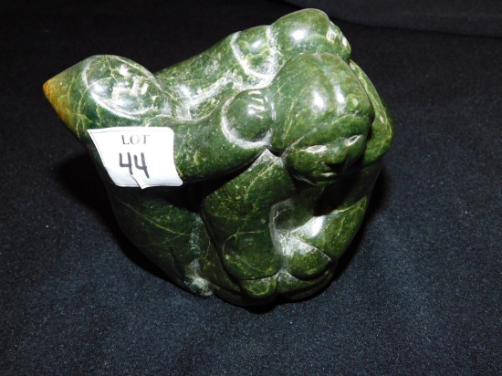 ESKIMOS CARVING, BELIEVED TO BE MADE OUT OF JADE, MEASURES 6" TALL X 5.5" W