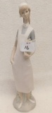 LLADRO, NURSE HOLDING A REPORT.   MEASURES 14