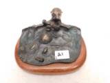 BRONZE SEA OTTER BY WAH CHANG, SIGNED.  MEASURES 3 1/4