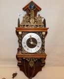 GERMAN CLOCK #241-080 WOOD SURROUND WITH METAL PIECES IN GERMAN, MEASURES 2