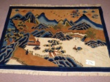 RUG:   MOUNTAIN SCENE.  BLUE, BEIGE, & TANS, MEASURES 48.5 