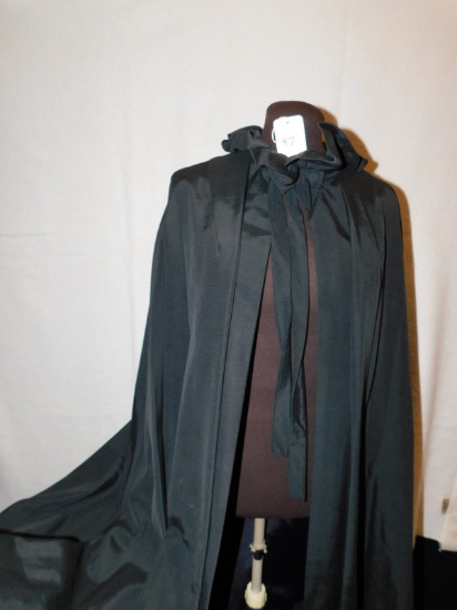 CAPE:  MISS ELLIETTE BY CALIFORNIA, BLACK CAPE, BUTTON CLOSURE AT NECK, WIT