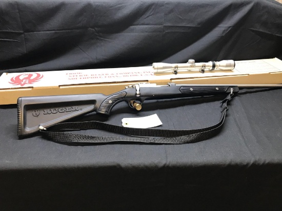 RUGER MODEL 77-22, 22 MAG. SKELETON STOCK, RINGS AND SCOPE. IN BOX. SN-701-66665