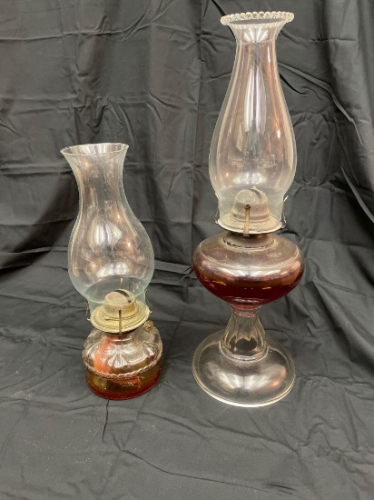 Two antique oil lamps. Sold together.