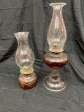 Two antique oil lamps. Sold together.