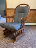 Wooden framed glider chair with upholstered cushion