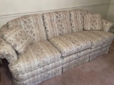 White floral sofa. 87?.