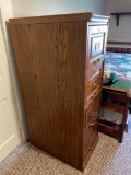 Wooden 4-drawer file cabinet. No key.