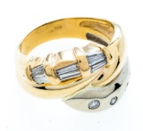 14kt Gold Fancy Crossover Design Ring. 11 Round & Baguette Diamonds = .59ct. Appraisal $5550.00