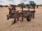 International 4 Bottom Rollover Plow w/Double Crow Foot Packing Wheels