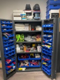 Storage Cabinet Filled with Unused Tools and Supplies