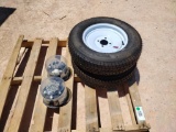 (2) Unused Wheels w/Tires and (2) Trailer Hubs
