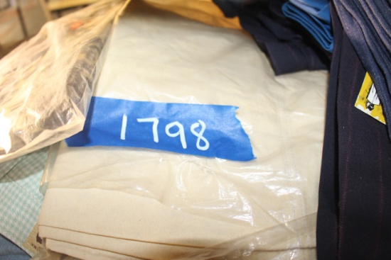 Assortment of various vintage items including clothing in different sizes and styles including pants
