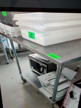 4 FOOT SS TABLE WITH CAN OPENER AND UNDER SELF