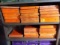 (51) 2000 Mopar Repair Manuals on 2 Shelfs - Orange