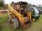 Komatsu SK1026 Skid Steer Loader, Rear Weights, Fair Tires, No Bucket, ___