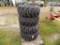 (4) New 12-16.5 Tires on Cat Rims (4x Bid Price)
