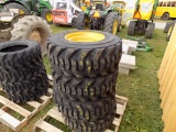 Set of (4) 12-16.5 Mtd SSL Tires on CAT/JD Rims (4x Bid Price)