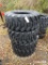 (4) New 12-16.5 SSL Tires (4 x Bid Price)