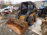 New Holland LX665 Skidsteer, Turbo, 66'' Bucket w/ LOEGRINE Steel Tracks, S