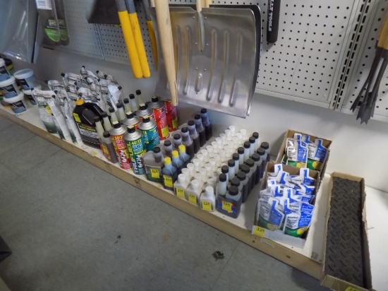 Asst. of Small Engine Fluids on Bottom Shelf - 2-Cycle Oil, Stabil, Premixe