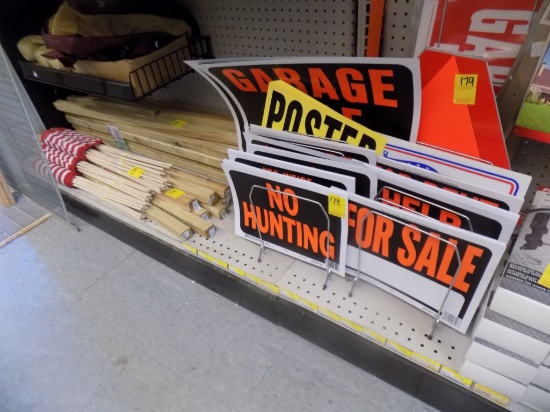 Group of Signs & Small American Flags on Bottom Shelf w/ Wooden Railing Par