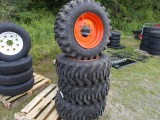 12-16.5 SSL Tires on Orange Bobcat Rims (4 x Bid Price)