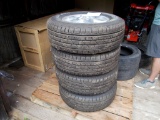 (4) Cooper Discover SRX K235/70/R-16 Tires on 5-Lug Ford Escape Rims, 2008-