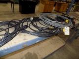 Group of Extension Cords on Shelf