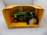 JD 720 Tractor in 1/16 Scale by Ertl.  The Toy Tractor Times Anniv. 1994