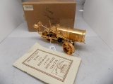 JD Gold Plated 3 Wheeled Tractor in 1/16 Scale.  ''People Make The Differen