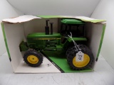 JD MFWS Row Crop Tractor w/ Cab and Duals in 1/16 Scale by Ertl.