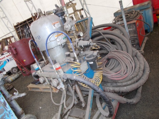 Graco Plural Component Pump With Arctic Heaters and Hose