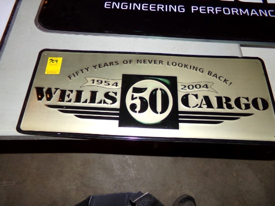 Wells Cargo 1954-2004 50 Year Anniversary Tin Sign, 24'' x 10''