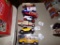 (4) 1:64 Scale Trucks - Hersheys, (1) Small Scale Checkered Cab, (1) True V