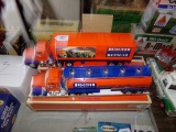 (2) Lionel Plastic Tractor Trailers, (1) Smoke Fluid Tanker and (1) Box Tra