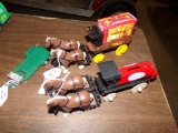 (2) Horse Drawn Wagons True Value, and Barnums Animal Crackers w/ a Small S