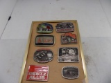 (8) Assorted Deutz Allis & Gleaner Belt Buckles on Frame (Very Nice Set)