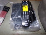 Group of Remotes, Cords and a Calculator